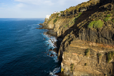 Beautiful cliffs of in Los Realejos by the sea during a sunny day, Tenerifeの写真素材