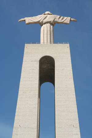 Statue of Cristo Rei in Lisbon, Portugal.  Built in the 1950s is inspired by the statue in Rio de Janeiro, Brazil.  Statue stands 28m tall.の写真素材