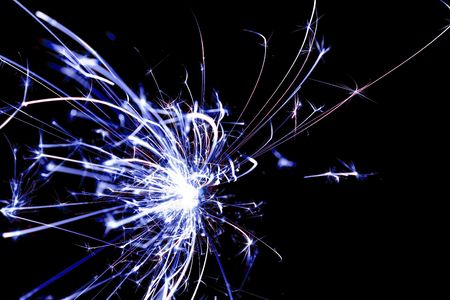 Blue sparkler used for celebrations.の写真素材