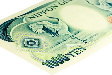 One Thousand Yen banknote isolated on a white background with focus on the 1000.の写真素材