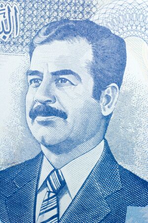 Close-up of one hundred Iraqi dinars banknote.  Features Saddam Hussein.の写真素材
