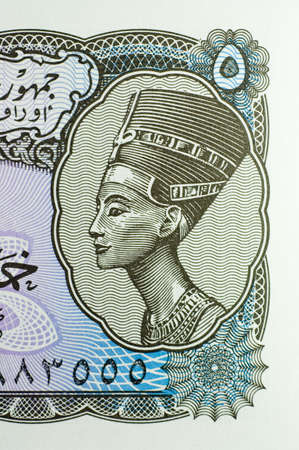 Close-up of five Egyptian piastres banknote isolated on a white background. Features portrait of...