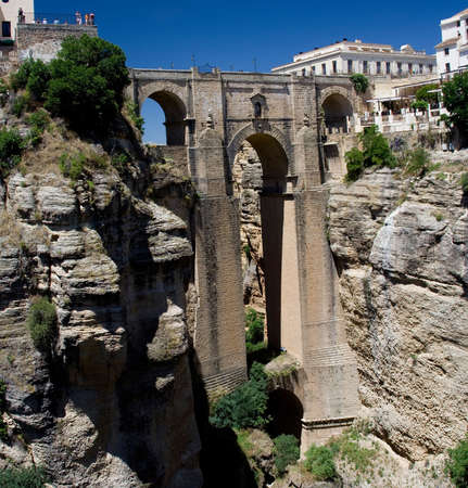 The Puente Nuevo (new bridge) in Ronda, Spain spans the 120m deep chasm which divides the city.