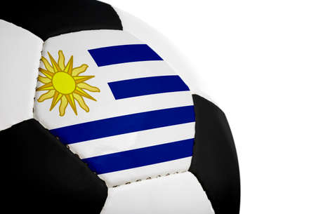 Uruguayan flag painted/projected onto a football (soccer ball).  Isolated on a white background.の写真素材