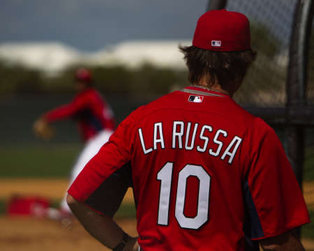 JUPITER, FL USA - Feb. 28, 2011: Manager Tony La Russa watches pre-game practice before the St. Louis Cardinals vs. Florida Marlins pre-season game.のeditorial素材