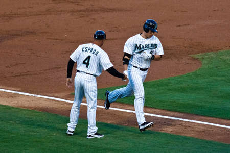 MIAMI, FL USA - APR. 22: Marlin outfielder Chris Coghlan rounds the bases after hitting a lead-off home run in the first inning of the Colorado Rockies vs. Florida Marlins game April 22, 2011 in Miami, FL.のeditorial素材