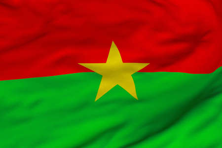 Detailed 3D rendering closeup of the flag of Burkina Faso.  Flag has a detailed realistic fabric texture and an accurate design and colors.の写真素材