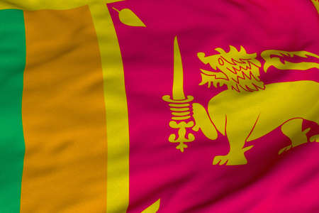 Detailed 3D rendering closeup of the flag of Sri Lanka.  Flag has a detailed realistic fabric texture and an accurate design and colors.の写真素材