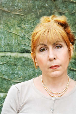 Portrait of mature Irish woman with red hairの写真素材