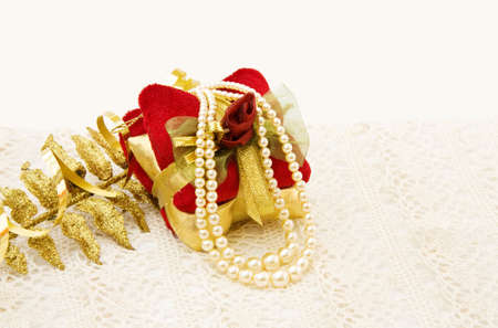 Vintage Christmas gift decoration and pearlsの写真素材