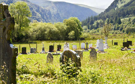 Peaceful ancient celtic cemetery at Glendalough, in Wicklow mountains, Ireland. の写真素材