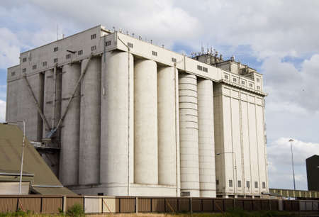 Shipping and transportation - big storage silos in Dublin port. 