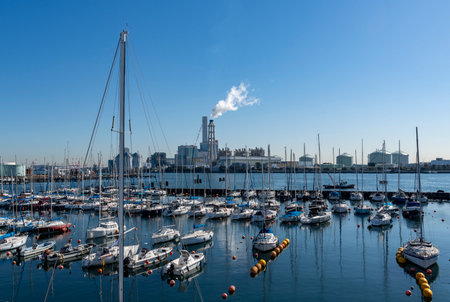 Yokohama City, Kanagawa Prefecture Scenery of Yacht Harbor and Thermal Power Plantの写真素材