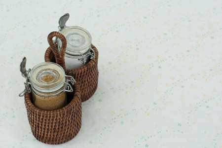 Sugar packet on a wooden Basketの写真素材