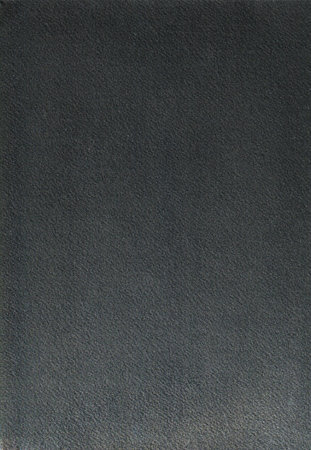 Dark cotton paper texture with dust, lint and debris. Colored cotton paper with light glare.の写真素材