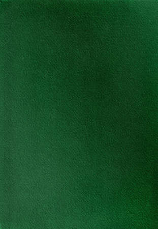 Green cotton paper texture with dust, lint and debris. Colored cotton paper with light glare.の写真素材