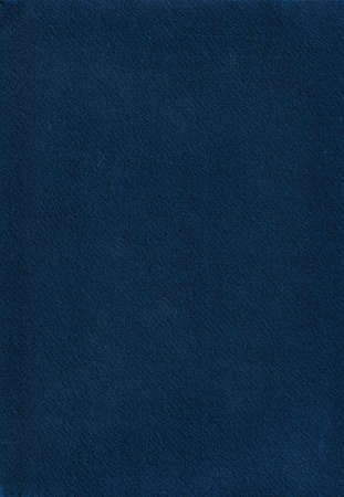 Blue cotton paper texture with dust, lint and debris. Colored cotton paper with blue shadows.の写真素材