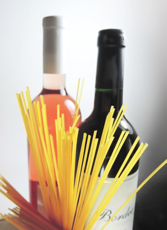 wine bottles and spaghetti, studio shotの写真素材