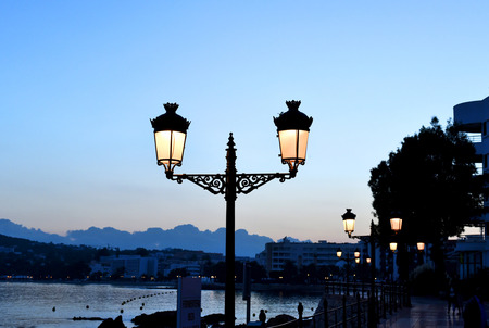 Antique street lights on the promenade of Santa Eulalia, Ibiza Iceland.のeditorial素材