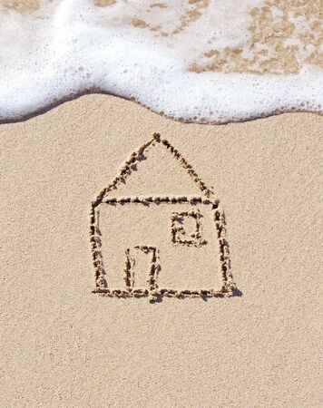 Home, drawing on the sandの写真素材