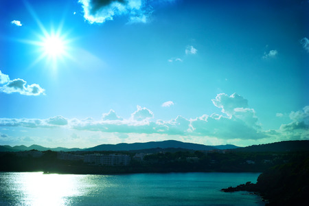 sunbeam over to Iceland with copy space and view over the sea. Turquoise toned image.の写真素材