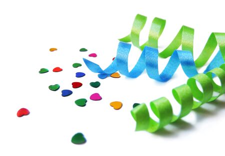 Curly ribbon and glitter, isolated on whiteの写真素材