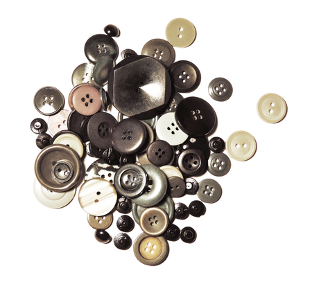 Sewing buttons, heap of vintage buttons isolated on white background.