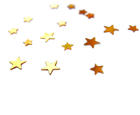 Party glitter, isolated on white. Star shape confetti on white.