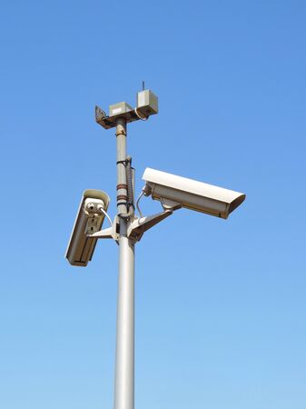 Security cameras and blue sky, security system.の写真素材