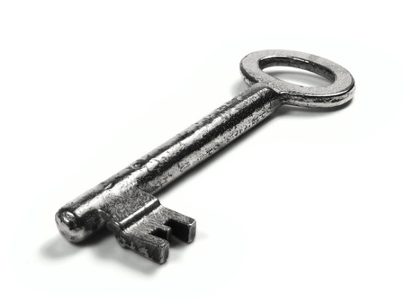 Silver key, old key isolated on white background.の写真素材