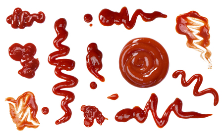 Ketchup splashes, group of objects. Arrangement of red ketchup or tomato sauce, isolated white background, top view.の写真素材