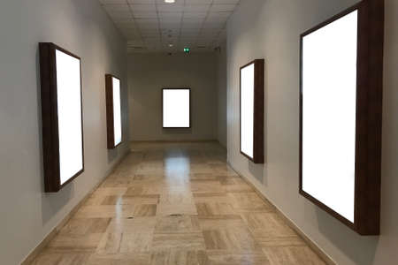 Multiple empty blank poster screens at a hallway ideal for digital kiosk visual  communication,...