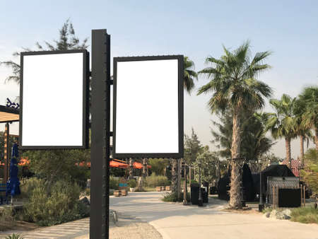Outdoor light boxes at a park with trees and pavement ideal for sale discount promotion mock up