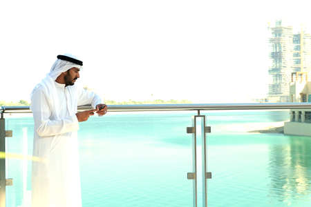 Isolated shot of Middle East man wearing kandura UAE men's clothes