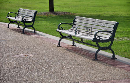 Two park benches in a public park