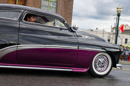 COEUR D ALENE 6-13-2014  Car d  Alene 2014  man peers from roadster   