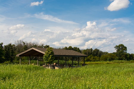 Shelter at Channahon State Park surrounded by green prairie in Illinois, USA.の写真素材