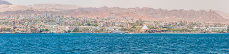 Eilat, Israel - May 15, 2012: Seascape view from the Red sea on Eilat city, southern resort in...