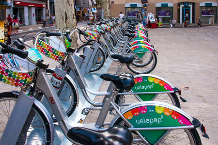 Avignon, France - July 22, 2011: Row of bicycles for rent in Old Town of Avignon, France during the...