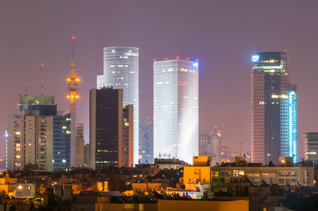 Tel Aviv, Israel - May 07, 2012: Night downtown Tel-Aviv skyline cityscape. Here you can see several popular skyscrapers of Tel Aviv like Azrieli Center, Defense Force Headquarters and more.のeditorial素材