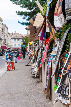 Avignon, France - July 22, 2011: Old Town street full of art posters during the Avignon Festival Off. Avignon Festival, is an annual arts festival held in French city of Avignon every summer in Julyのeditorial素材