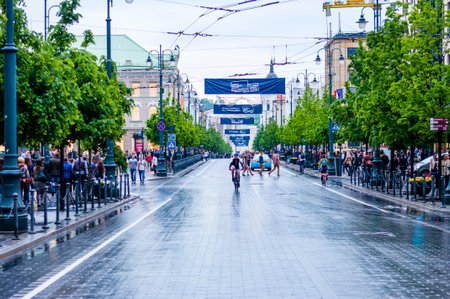 Vilnius, Lithuania - May 17, 2014: City center of Vilnius. Wet Gediminas avenue after heavy spring rain. After one hour of this spring rain the city came back to its normal dynamics.のeditorial素材