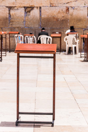 Jerusalem, Israel - May 25, 2012: Prayer table standing near the Western Wall, holy place, the last remains of Jewish Temple in Jerusalem, Israelのeditorial素材