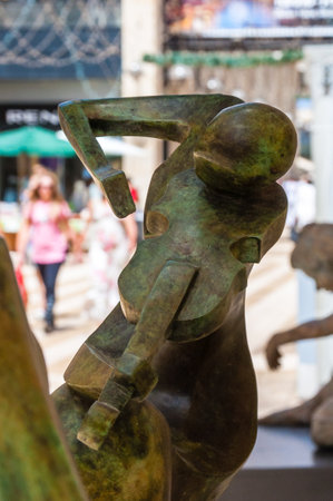 Jerusalem, Israel - May 25, 2012: View on Mamilla road through street art bronze sculpture of woman violinist playing on violin. Jerusalem, Israelのeditorial素材