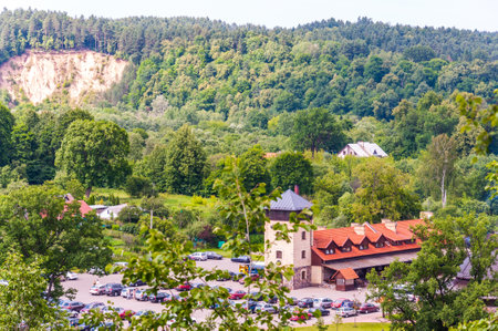 Vilnius, Lithuania - June 30, 2012: View on scenic landscape of Pavilnius National Park in Vilnius, Lithuania. Parking full of cars and visitors, green forest, famous sand cliff on backgroundのeditorial素材