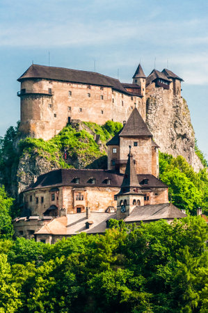 Szeged, Hungary - June 18, 2013: Orava Castle or OravskÃ½ hrad is situated on a high rock above Orava river in the village of OravskÃ½ PodzÃ¡mok, Slovakia. It is the most beautiful castles in Slovakia.のeditorial素材
