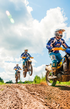 Vilnius, Lithuania - July 14, 2013: A group of amateur motorcyclists practice their manoeuvres. This is a multiple exposure shot taken on public landのeditorial素材