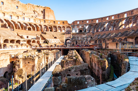 Rome, Italy - November 17, 2018: Tourist watching the famous Colosseum or Coliseum, also known as the Flavian Amphitheatre, is an oval amphitheatre in the center of the city of Rome, Italyのeditorial素材