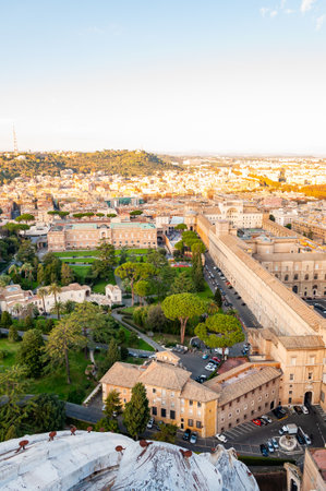 High view on Rome cityscape with green and cozy Vatican gardens and museums buildings on foregroundのeditorial素材