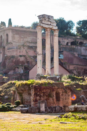 Rome, Italy - November 17, 2018: View on the Temple of Castor and Pollux and on Domus Tiberiana palace remains ruins as a part of west edge of Palatine hill with highest viewpoint on Forumのeditorial素材